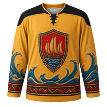 Load image into Gallery viewer, Hiri Moale Festival Original Hockey Jersey in Gold, front view with themed artwork and clean crest