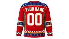 Load image into Gallery viewer, Ugly Christmas Nutcracker Hockey Jersey in Toy Soldier Red, back view of the hockey jersey with a gold star and candy stripe yoke and matching present sleeve bands and hem stripe band, YOUR NAME arc and 00 number, custom name and number
