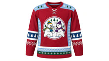 Load image into Gallery viewer, Ugly Christmas Polar Bear Hockey Jersey in Cranberry, front view of a hockey jersey with cranberry red body, ice blue shoulder yoke printed with snowflakes and pine trees, ice blue side panels, navy pine-tree elbow bands, white zigzag cuff bands and an ice blue and pine green snowflake hem stripe band, and a round crest of two cartoon polar bears in a snowball fight on the chest, custom name and number