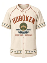 Load image into Gallery viewer, Hoboken Heritage Baseball Jersey in Cream, front view – cream body with terracotta piping, ballfield emblem with Hudson River skyline and rope-and-star trim, 1846 – custom name and number