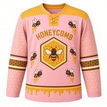 Load image into Gallery viewer, Honeycomb Bees Original Hockey Jersey in Blush Blossom, front view – honeycomb pattern with friendly honeybees and hexagon crest, custom name and number