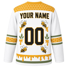 Load image into Gallery viewer, Honeycomb Bees Original Hockey Jersey in Clover White, back view with your name and number – hexagon yoke and honey-drip hem stripes
