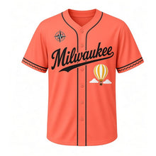 Load image into Gallery viewer, Hot Air Balloon Milwaukee Baseball Jersey in Sunrise Coral, front view – striped hot air balloon and clouds graphic with compass-rose crest, custom name and number