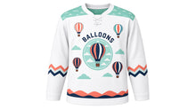 Load image into Gallery viewer, Hot Air Balloon Skies Original Hockey Jersey in Cloud White, front view – colorful striped hot air balloons floating through a bright sky with balloon crest, custom name and number