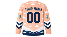 Load image into Gallery viewer, Hot Air Balloon Skies Original Hockey Jersey in Sunrise Peach, back view with your name and number – cloud-pattern yoke and balloon-stripe chevron sleeve bands