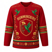 Load image into Gallery viewer, Hummingbird Garden Original Hockey Jersey in Ruby Throat, front view – two hovering hummingbirds, trumpet flowers and single-hummingbird oval crest, custom name and number