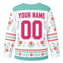 Load image into Gallery viewer, Hummingbird Garden Original Hockey Jersey in Blossom White, back view with your name and number – leaf-pattern yoke and flower-and-leaf hem stripes
