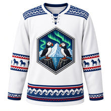 Load image into Gallery viewer, Iceland Original Hockey Jersey in Glacier White, front view – basalt-column crest of puffins under the aurora, ornate lopapeysa knit-pattern yoke, detailed artwork, custom name and number