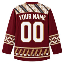 Load image into Gallery viewer, Indonesia Original Hockey Jersey in Lava Maroon, back view – diagonal parang batik yoke and ornate sleeve bands, with your name and number