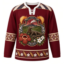 Load image into Gallery viewer, Indonesia Original Hockey Jersey in Lava Maroon, front view – ornate Komodo dragon and rice-terrace kawung crest with Rafflesia and bird-of-paradise and diagonal parang batik yoke, detailed artwork, custom name and number