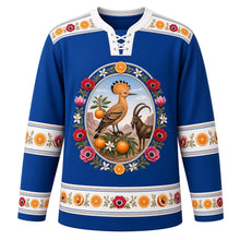 Load image into Gallery viewer, Israel Original Hockey Jersey in Mediterranean Azure, front view – ornate hoopoe, Jaffa orange and Nubian ibex crest, anemone wreath and Bauhaus White City geometric yoke, detailed illustrated artwork, custom name and number