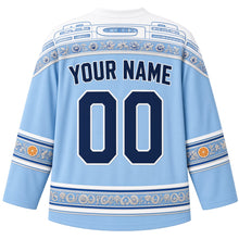 Load image into Gallery viewer, Israel Original Hockey Jersey in Galilee Sky Blue, back view – ornate Bauhaus geometric yoke with embroidered anemone rows and citrus-blossom sleeve bands, with your name and number