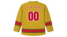 Load image into Gallery viewer, Jakarta Original Hockey Jersey in Monas Gold, back view with your name and number