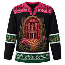 Load image into Gallery viewer, Jordan Original Hockey Jersey in Wadi Rum Black, front view – ornate Petra Treasury crest with Sinai rosefinch, black iris and Wadi Rum dunes, tatreez cross-stitch yoke, detailed illustrated artwork, custom name and number