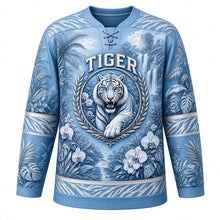 Load image into Gallery viewer, Jungle Tiger Roar Original Hockey Jersey in Snow Tiger Blue, front view – roaring tiger emerging from tropical jungle leaves with leaf-wreath crest, custom name and number