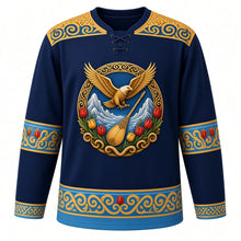 Load image into Gallery viewer, Kazakhstan Original Hockey Jersey in Nomad Night Navy, front view – ornate golden eagle over Tian Shan peaks crest with dombra and wild tulips, qoshqar muiiz ram's-horn felt yoke, detailed illustrated artwork, custom name and number