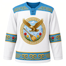 Load image into Gallery viewer, Kazakhstan Original Hockey Jersey in Tian Shan White, front view – ornate golden eagle over Tian Shan peaks crest with dombra and wild tulips, qoshqar muiiz ram's-horn felt yoke, detailed illustrated artwork, custom name and number