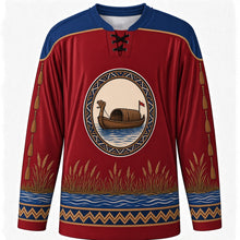 Load image into Gallery viewer, Kuomboka Ceremony Original Hockey Jersey in Lozi Red, front view with themed artwork and clean crest