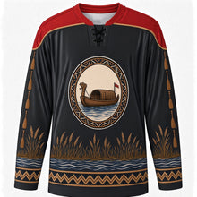 Load image into Gallery viewer, Kuomboka Ceremony Original Hockey Jersey in Barge Black, front view with themed artwork and clean crest