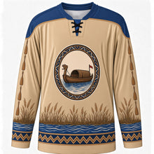 Load image into Gallery viewer, Kuomboka Ceremony Original Hockey Jersey in Floodplain Reed, front view with themed artwork and clean crest