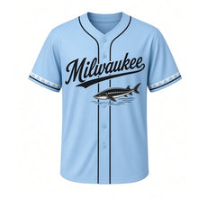 Load image into Gallery viewer, Lake Sturgeon Run Milwaukee Baseball Jersey in Spring Sky Blue, front view – lake sturgeon swimming graphic with fish-scale crest, custom name and number