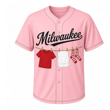Load image into Gallery viewer, Laundry Line Milwaukee Baseball Jersey in Line Dry Pink, front view – backyard clothesline with clothespins and laundry graphic, custom name and number