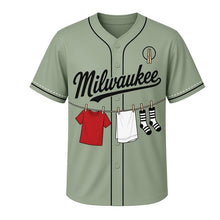Load image into Gallery viewer, Laundry Line Milwaukee Baseball Jersey in Backyard Sage, front view – backyard clothesline with clothespins and laundry graphic, custom name and number