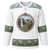 Load image into Gallery viewer, Lesotho Original Hockey Jersey in Highland Snow White, front view – Maletsunyane Falls, Mount Qiloane and Basotho pony crest with spiral aloe, Basotho blanket-pattern yoke and woven-grass sleeve bands, ornate detailed artwork, custom name and number