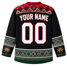 Load image into Gallery viewer, Libya Original Hockey Jersey in Sahara Night Black, back view with your name and number – Ghadames painted-geometry yoke, Amazigh kilim sleeve bands and date-palm hem band, ornate detailed artwork