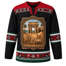 Load image into Gallery viewer, Libya Original Hockey Jersey in Sahara Night Black, front view – Leptis Magna arch and date palm crest with fennec fox and Acacus rock art, Ghadames painted-geometry yoke and Amazigh kilim sleeve bands, ornate detailed artwork, custom name and number