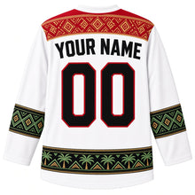 Load image into Gallery viewer, Libya Original Hockey Jersey in Ghadames Lime White, back view with your name and number – Ghadames painted-geometry yoke, Amazigh kilim sleeve bands and date-palm hem band, ornate detailed artwork