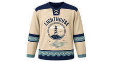 Load image into Gallery viewer, Lighthouse Coast Original Hockey Jersey in Sand Dune, front view – striped lighthouse on a rocky coast with a sweeping beam and lighthouse crest, custom name and number