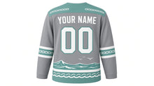 Load image into Gallery viewer, Lighthouse Coast Original Hockey Jersey in Storm Gray, back view with your name and number – rope-knot yoke and rope-and-wave sleeve stripes