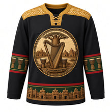 Load image into Gallery viewer, Mali Original Hockey Jersey in Bogolan Night, front view – bogolan mud-cloth yoke and kora-and-baobab crest with ornate detailed artwork, custom name and number