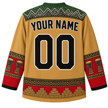 Load image into Gallery viewer, Mali Original Hockey Jersey in Sahel Gold, back view with your name and number – bogolan mud-cloth yoke and djembe sleeve bands