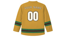Load image into Gallery viewer, Manaus Original Hockey Jersey in Opera Dome Gold, back view with your name and number