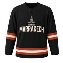 Load image into Gallery viewer, Marrakech Original Hockey Jersey in Black, front view – custom name and number