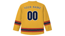 Load image into Gallery viewer, Matariki Original Hockey Jersey in Dawn Gold, back view with your name and number