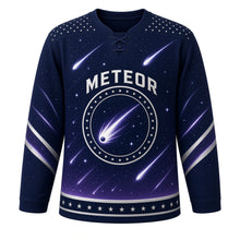Load image into Gallery viewer, Meteor Shower Original Hockey Jersey in Midnight Sky, front view – bright meteors streaking across a starry night sky with meteor crest, custom name and number