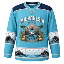 Load image into Gallery viewer, Micronesia Original Hockey Jersey in Lagoon Turquoise, front view – ornate rai stone crest with outrigger canoe and woven pandanus yoke, detailed artwork, custom name and number
