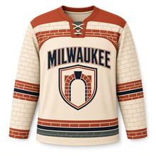 Load image into Gallery viewer, Milwaukee Brickworks Arch Original Hockey Jersey in Brick Cream, front view – custom name and number