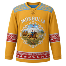 Load image into Gallery viewer, Mongolia Original Hockey Jersey in Naadam Gold, front view – ornate cloud-scroll medallion with Naadam horse race, ger and horsehead fiddle, khee yoke, detailed artwork, custom name and number