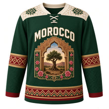 Load image into Gallery viewer, Morocco Original Hockey Jersey in Cedar Green, front view – zellige mosaic yoke and kasbah-arch argan tree crest with ornate detailed artwork, custom name and number