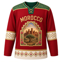 Load image into Gallery viewer, Morocco Original Hockey Jersey in Medina Red, front view – zellige mosaic yoke and kasbah-arch argan tree crest with ornate detailed artwork, custom name and number