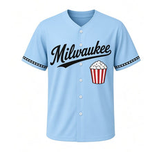 Load image into Gallery viewer, Movie Night Popcorn Milwaukee Baseball Jersey in Drive-In Sky Blue, front view – red-and-white striped popcorn bucket graphic, custom name and number