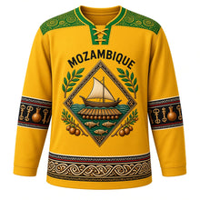 Load image into Gallery viewer, Mozambique Original Hockey Jersey in Cashew Gold, front view – capulana wax-print yoke and Makonde-carved dhow and timbila diamond crest with ornate detailed artwork, custom name and number