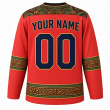 Load image into Gallery viewer, Mozambique Original Hockey Jersey in Coral Red, back view with your name and number – capulana wax-print yoke and timbila keyboard sleeve bands