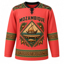 Load image into Gallery viewer, Mozambique Original Hockey Jersey in Coral Red, front view – capulana wax-print yoke and Makonde-carved dhow and timbila diamond crest with ornate detailed artwork, custom name and number