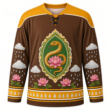 Load image into Gallery viewer, Nag Panchami Original Hockey Jersey in Earth Brown, front view with themed artwork and clean crest