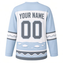 Load image into Gallery viewer, Narwhal Arctic Sea Original Hockey Jersey in Arctic Ice, back view with your name and number – snowflake yoke and wave-stripe sleeve bands